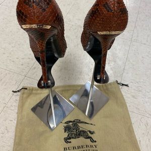 Very elegant authentic Burberry python pomp wear one time.